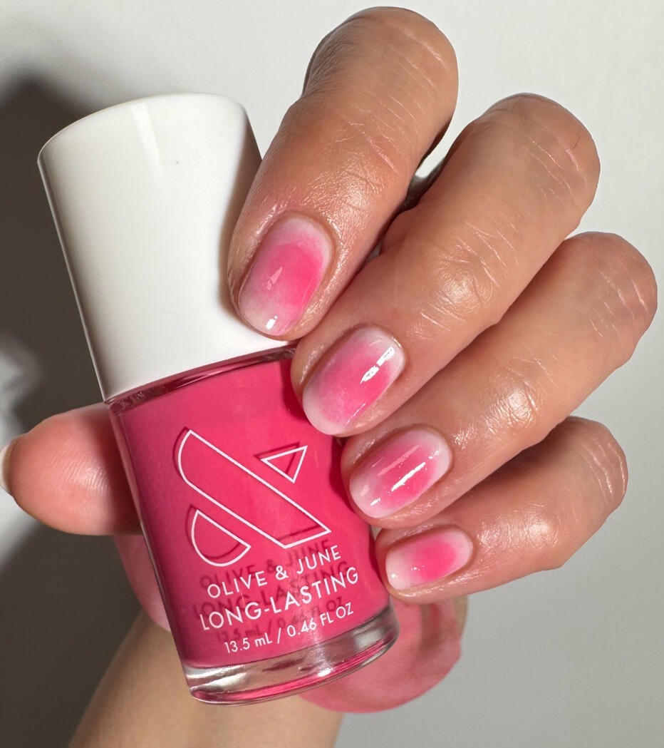 Aura manicure, Olive & June “Love All”, on short natural nails in daylight.